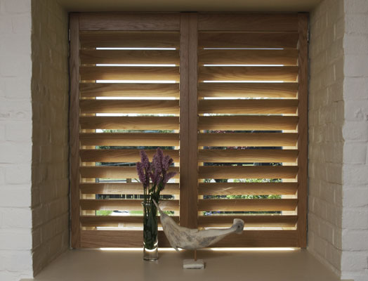 stained wooden shutters