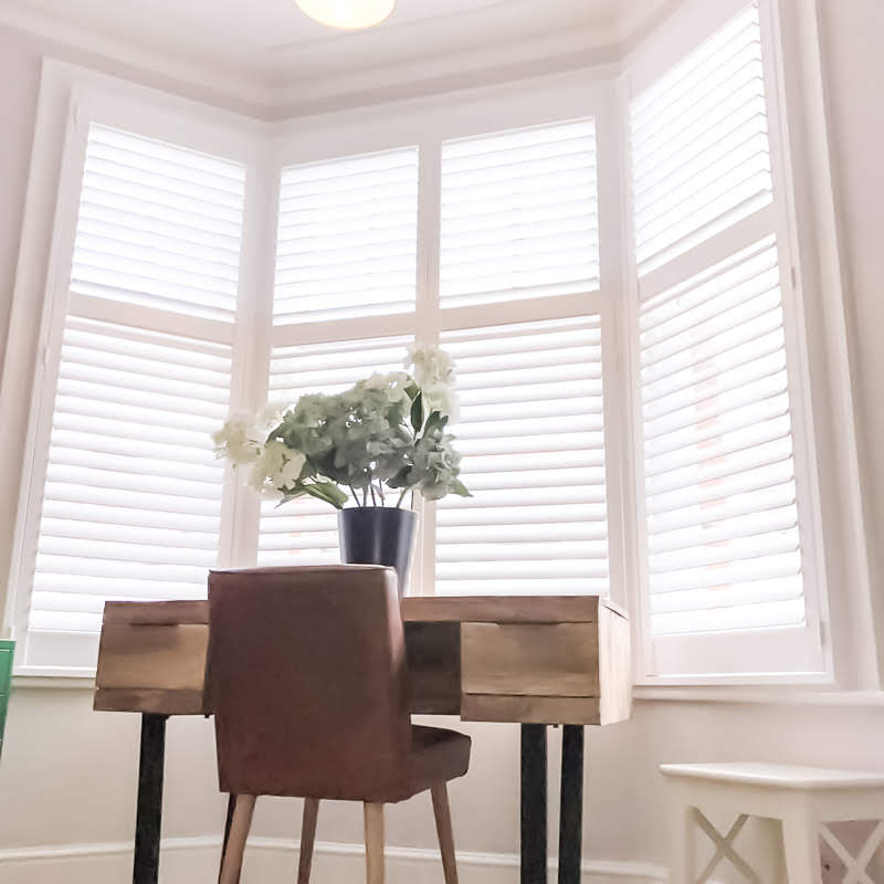 bay window plantation shutters