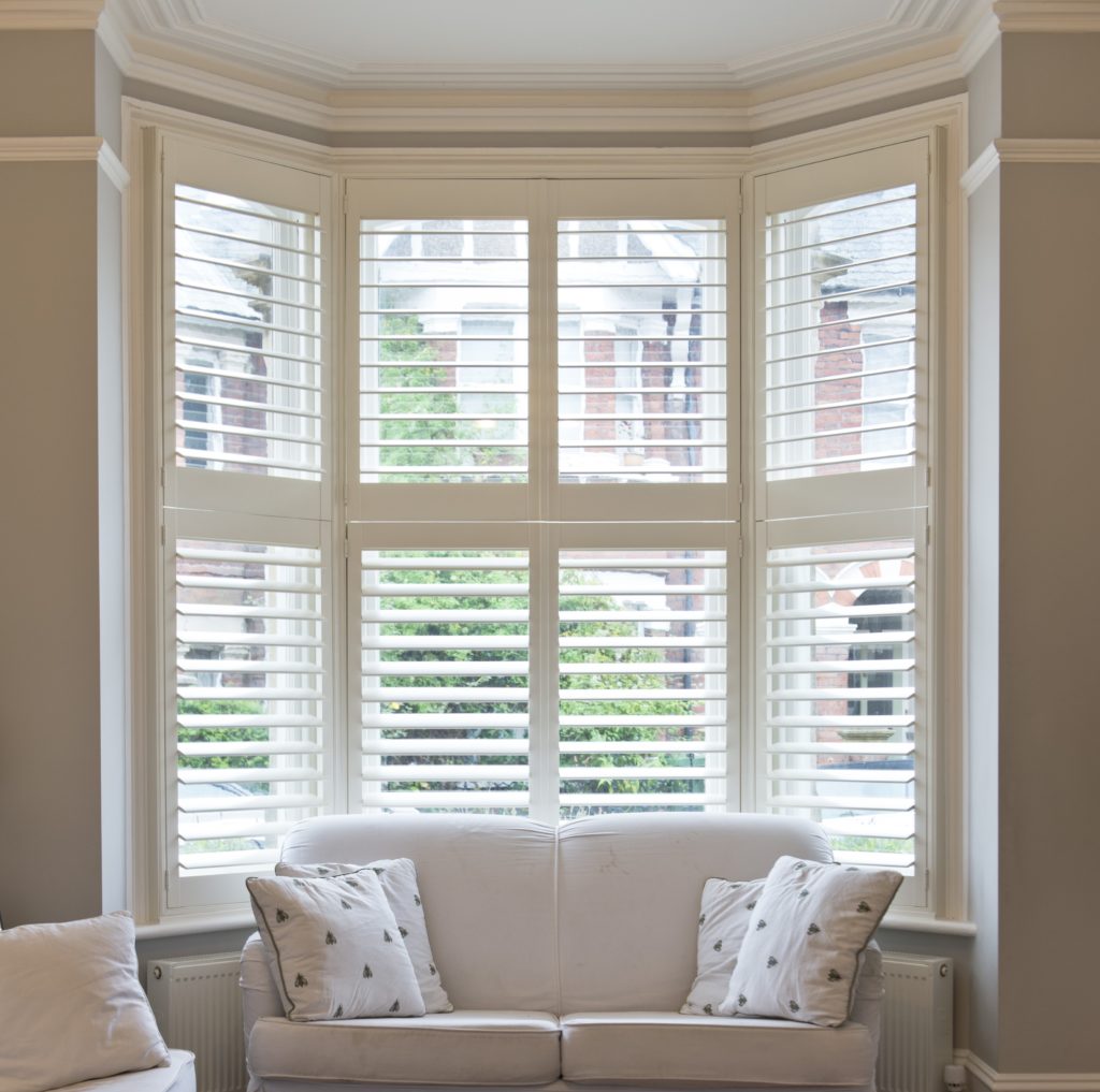 plantation shutters for bay windows